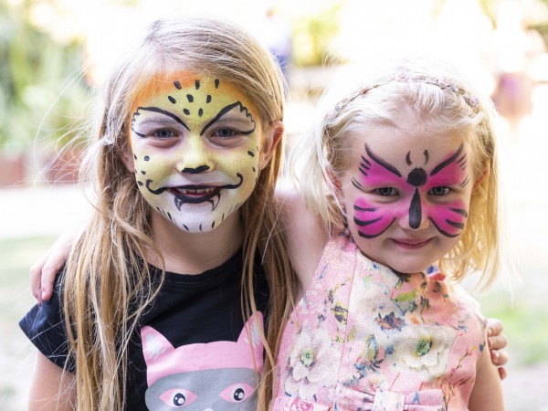 Community members were treated to free face painting